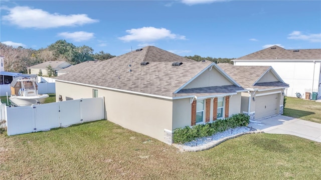 view of home's exterior with a lawn and a garage