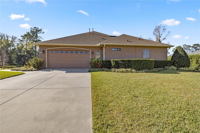 ranch-style home with a front yard and a garage