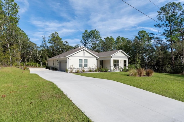 ranch-style house featuring a garage and a front lawn