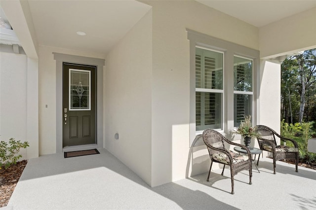 5477 N Princewood Dr, Beverly Hills, FL 34465 - doorway to property with stucco siding