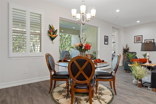 5477 N Princewood Dr, Beverly Hills, FL 34465 - dining room with a chandelier, wood finished floors, and recessed lighting