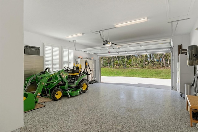 5477 N Princewood Dr, Beverly Hills, FL 34465 - garage featuring a garage door opener