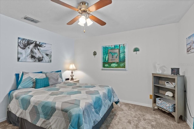 carpeted bedroom featuring ceiling fan