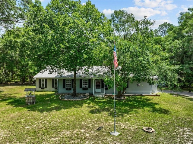 ranch-style home with a front yard