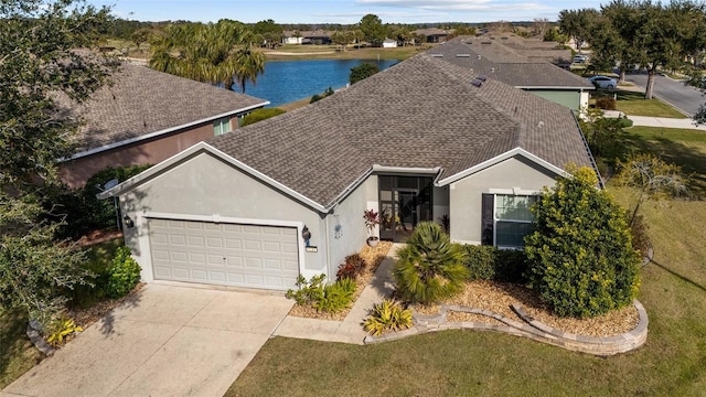 bird's eye view with a water view