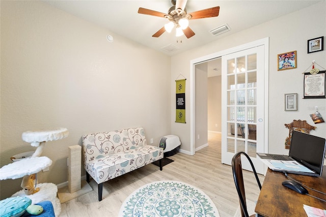 office area featuring light wood-type flooring and ceiling fan