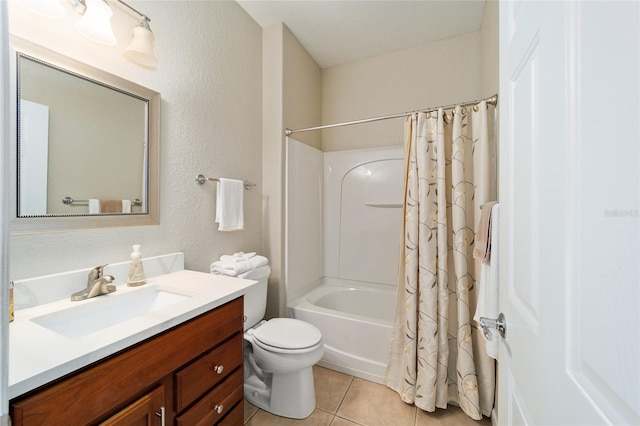 full bathroom featuring tile patterned floors, shower / bath combo, toilet, and vanity