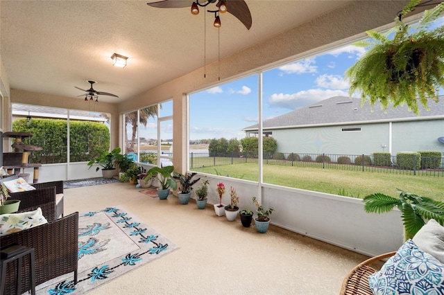 sunroom / solarium with ceiling fan