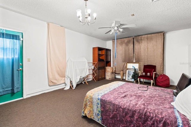 carpeted bedroom featuring ceiling fan with notable chandelier and a textured ceiling