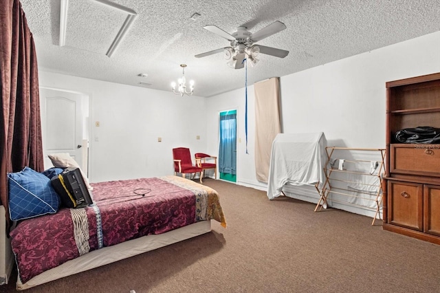 bedroom featuring ceiling fan, carpet, and a textured ceiling