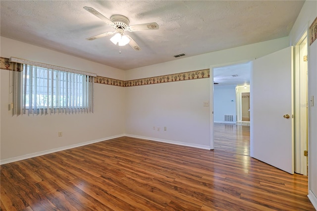 10185 SE 175th Ln, Summerfield, FL 34491 - unfurnished room featuring wood finished floors, ceiling fan, a textured ceiling, and baseboards