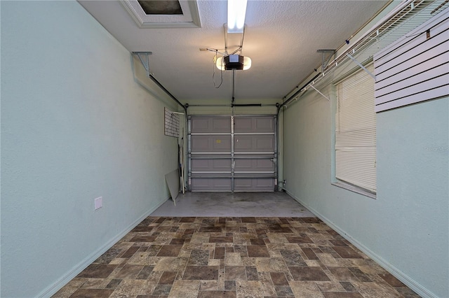 10185 SE 175th Ln, Summerfield, FL 34491 - garage featuring a garage door opener and baseboards