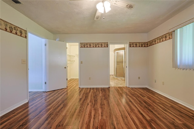 10185 SE 175th Ln, Summerfield, FL 34491 - unfurnished room with wood finished floors, baseboards, and a ceiling fan