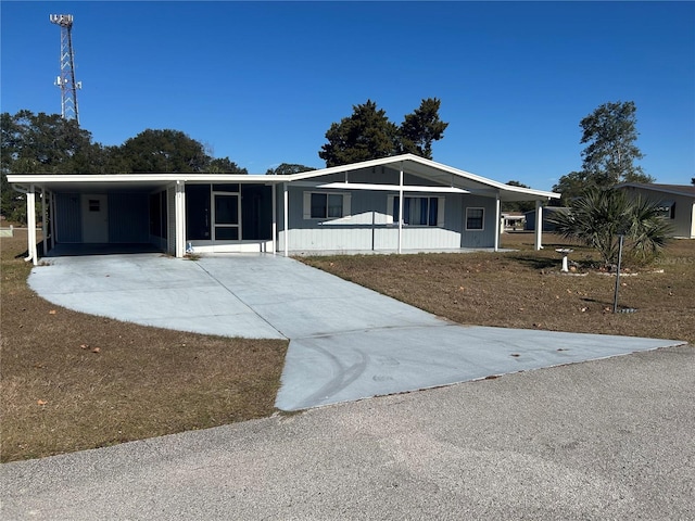 view of front of house featuring a carport