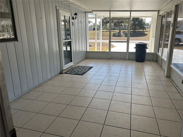 unfurnished sunroom with a healthy amount of sunlight