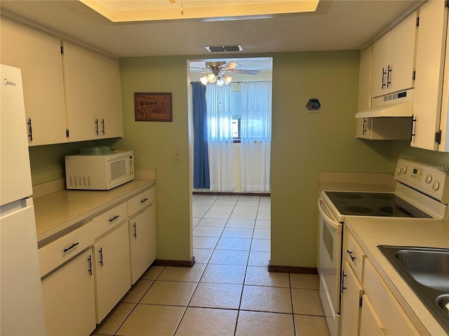 kitchen with sink, white cabinets, white appliances, ceiling fan, and light tile patterned floors