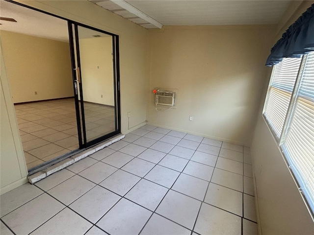 empty room with light tile patterned flooring