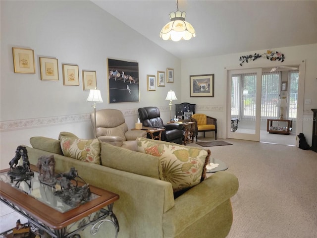 carpeted living room with lofted ceiling