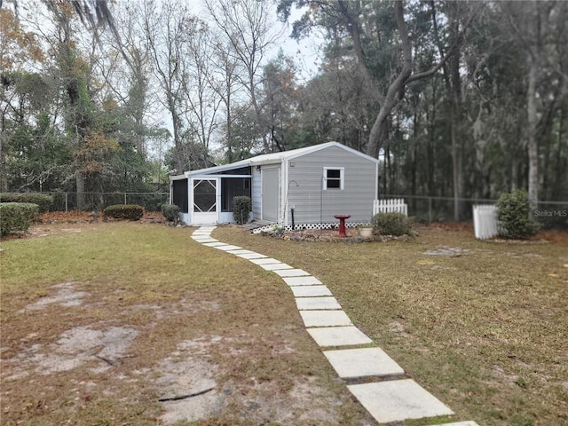 view of yard with an outdoor structure