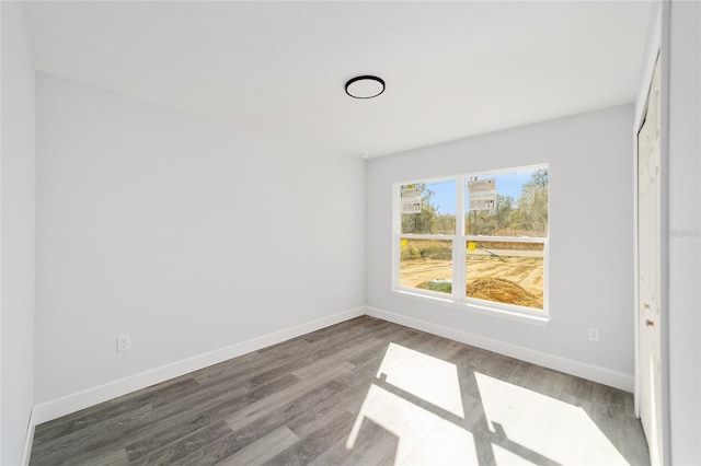 empty room featuring hardwood / wood-style floors