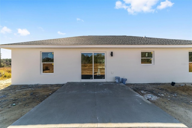 rear view of property with a patio