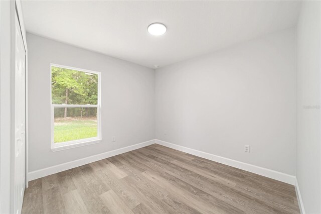55 Locust Loop Cir, Ocala, FL 34472 - unfurnished room featuring light wood-type flooring and baseboards