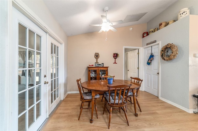 dining room featuring french doors, ceiling fan, and light hardwood / wood-style floors