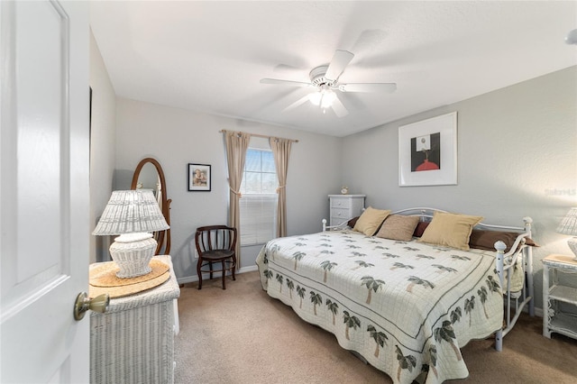 bedroom featuring ceiling fan and carpet flooring