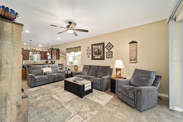 living room with ceiling fan