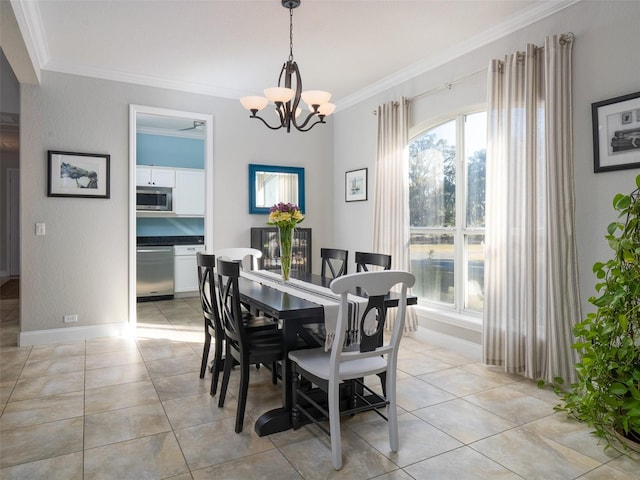 tiled dining room featuring ornamental molding and a notable chandelier