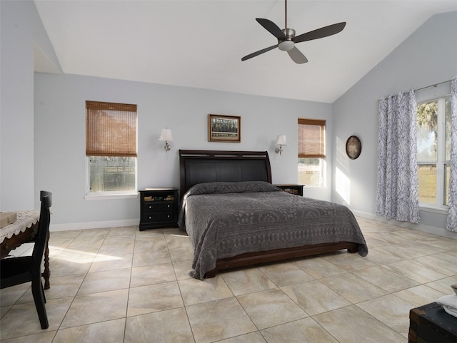 bedroom featuring vaulted ceiling, ceiling fan, and light tile patterned flooring