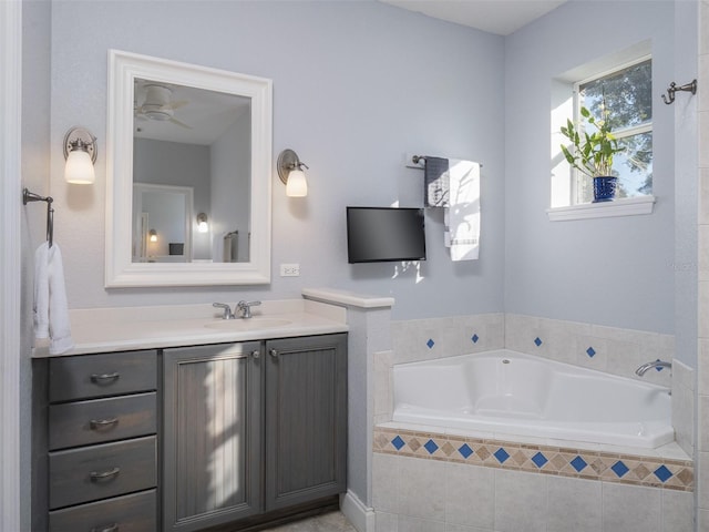 bathroom with vanity and tiled bath