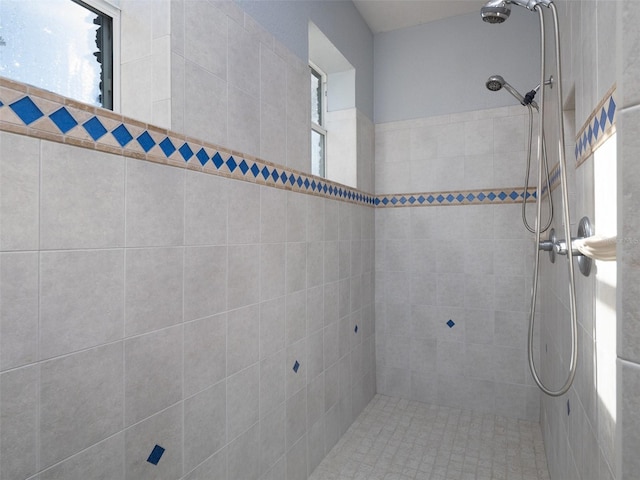 bathroom featuring tiled shower