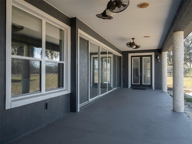 view of patio / terrace featuring ceiling fan