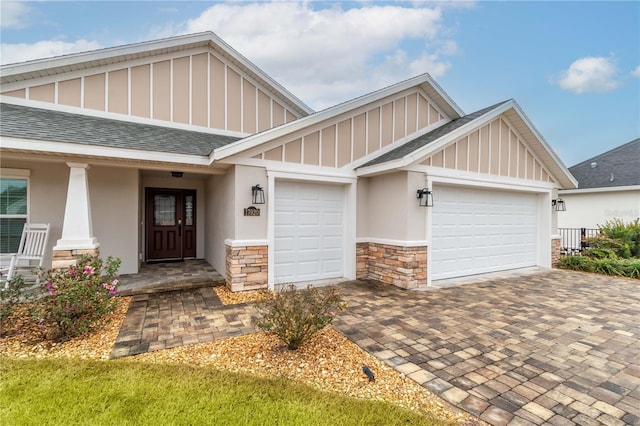 craftsman-style home with a garage