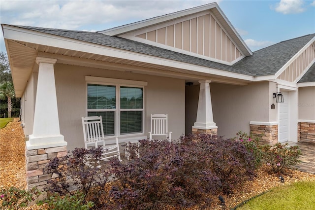 doorway to property featuring covered porch