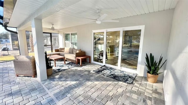 view of patio / terrace with ceiling fan and an outdoor hangout area