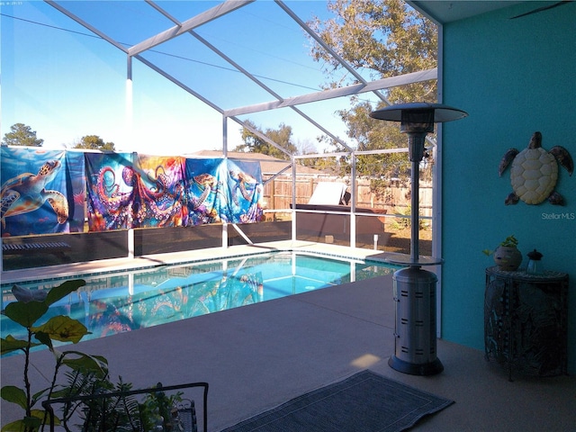 view of pool with a lanai