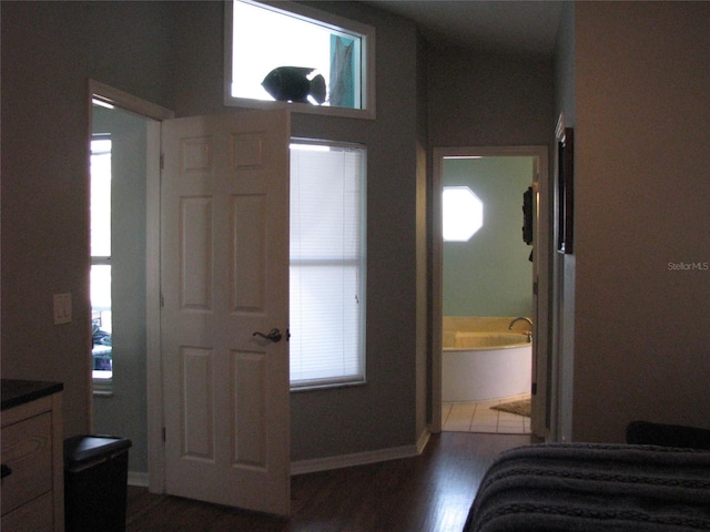 bedroom featuring dark wood-type flooring