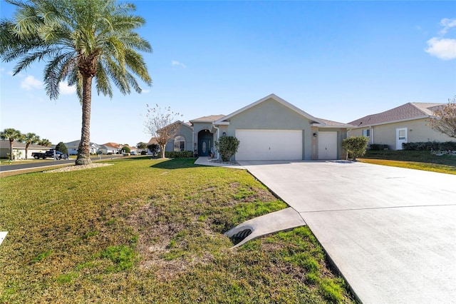 ranch-style home with a front yard and a garage