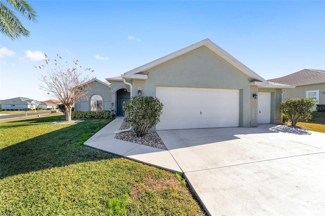 single story home with a front yard and a garage