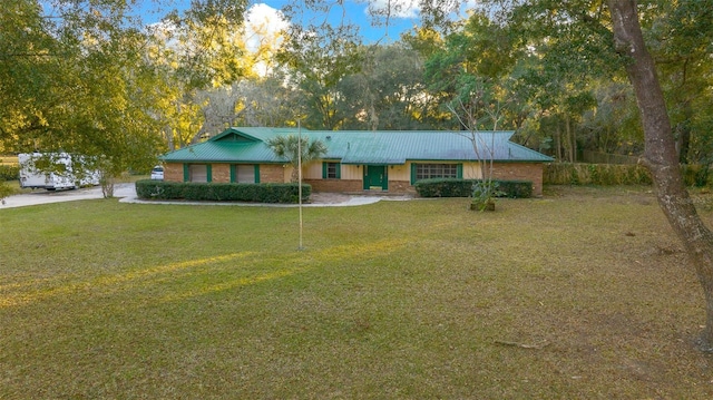 ranch-style house with a front yard