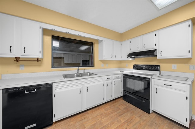 kitchen with white cabinets, sink, light hardwood / wood-style flooring, and black appliances