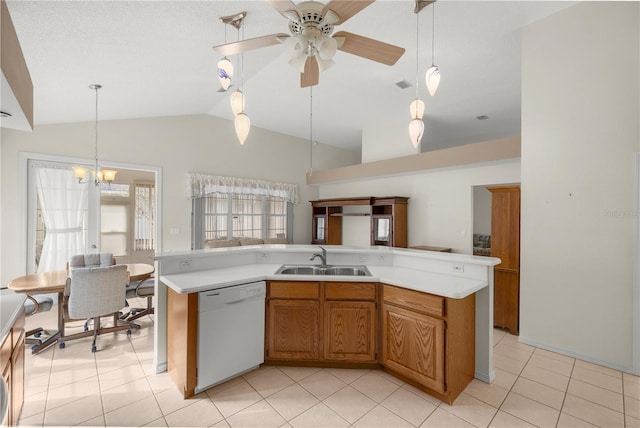 kitchen with dishwasher, an island with sink, vaulted ceiling, and sink