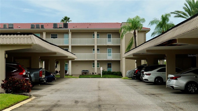 view of building exterior with a carport