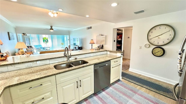 kitchen with sink, ceiling fan, dishwasher, and light stone counters