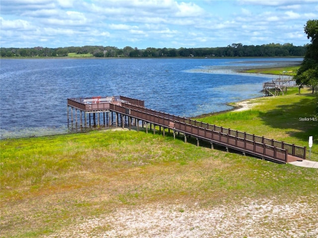 dock area featuring a water view