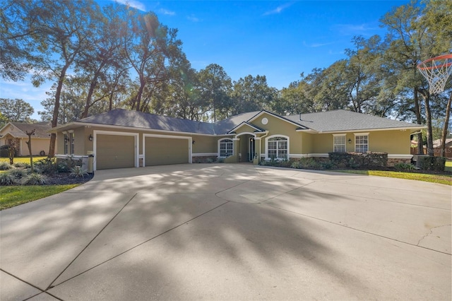 single story home featuring a garage