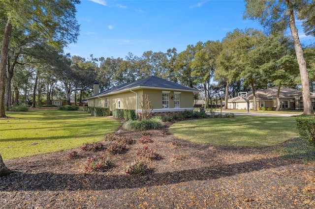 view of property exterior featuring a yard