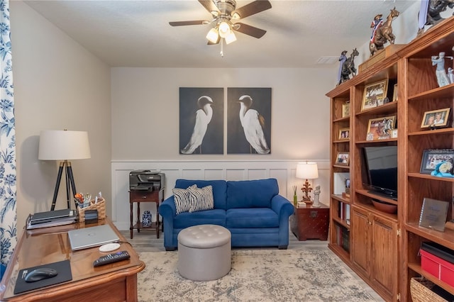 living room with ceiling fan